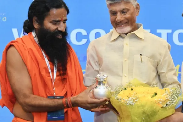 Andhra CM invites Baba Ramdev to promote wellness tourism