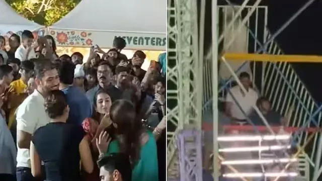 MS Dhoni special attraction at Ambani Navratri celebrations funny gestures on carnival rides